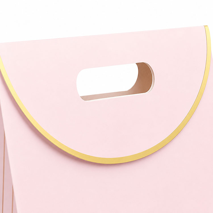 Die cut handle paper bag.jpg Die cut handle paper bag.jpg